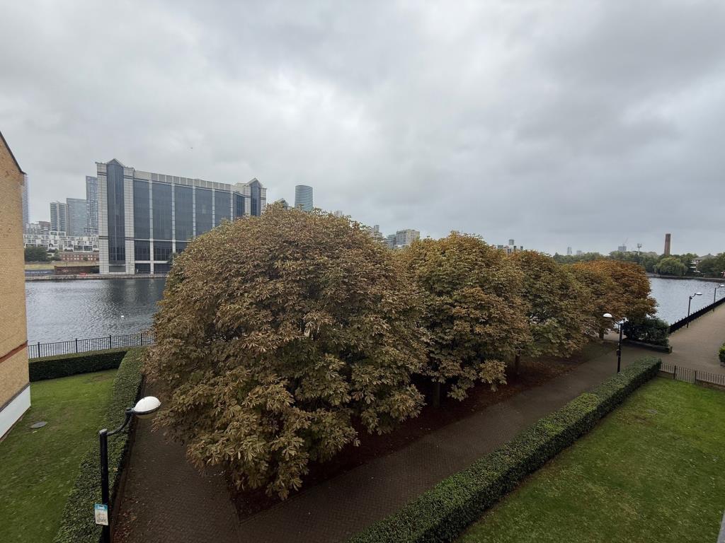 Lot: 179 - TWO-BEDROOM FLAT IN NEED OF IMPROVEMENT - View from reception room overlooking the Dock